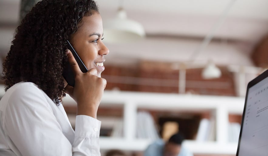 woman-on-phone-in-office-setting