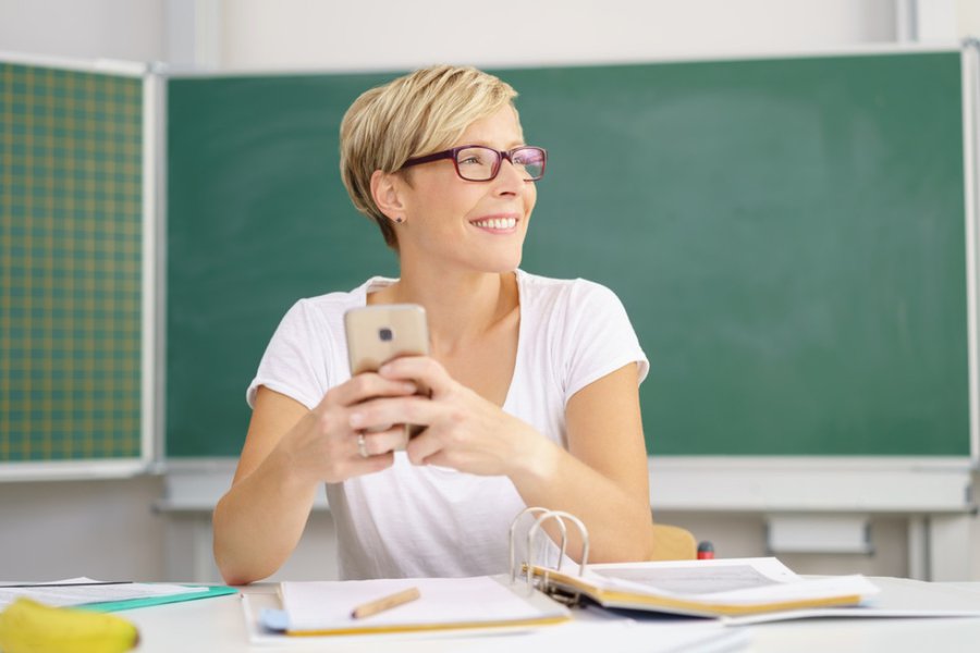teacher using cellphone