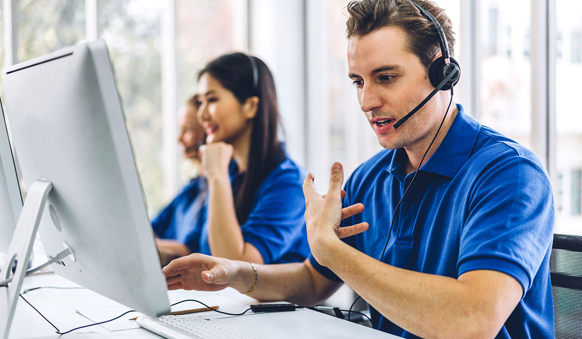 Group of happy call center smiling business operator customer support team